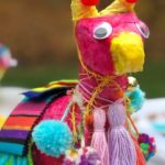 Image of a pink richly decorated llama